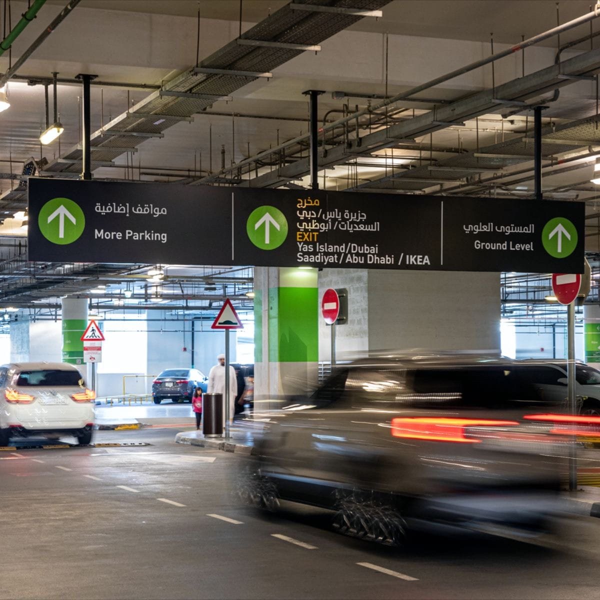 Kaiian Agency parking and traffic wayfinding signage guiding vehicles and pedestrians through a project environment in Riyadh Saudi Arabia.